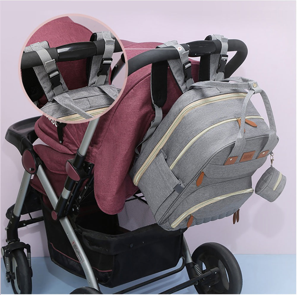 2-in-1 Nappy Backpack with fold out Travel Cot