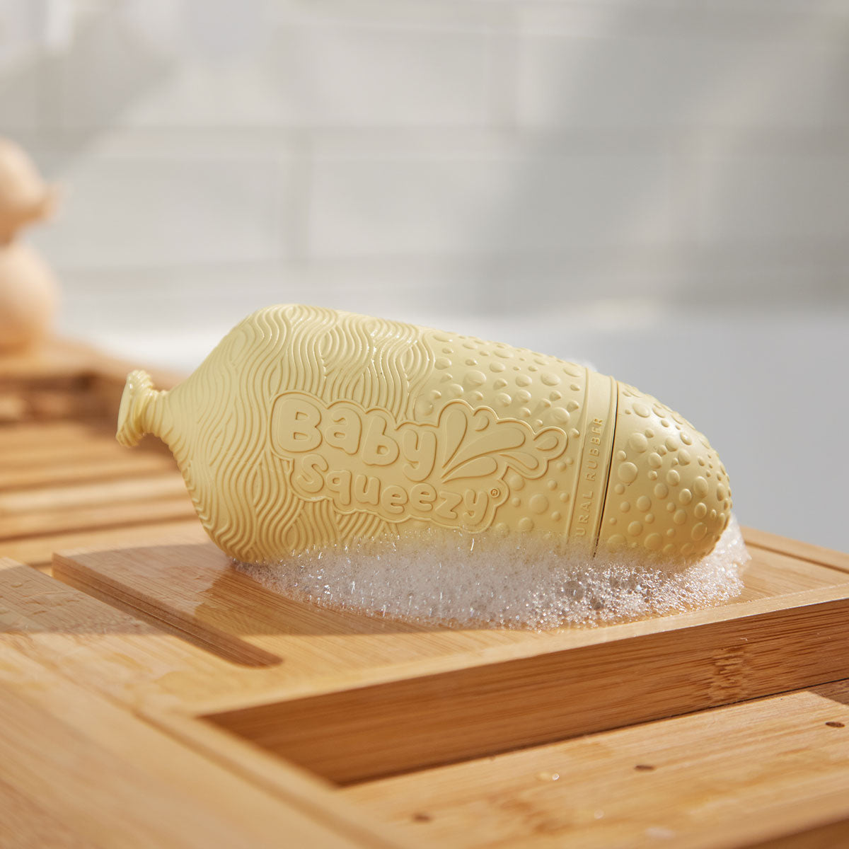 BabySqueezy is a 3-in-1: Newborn Bath Rinser, Teether & Toy