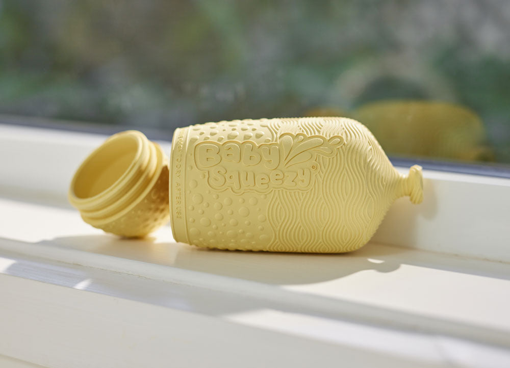 BabySqueezy is a 3-in-1: Newborn Bath Rinser, Teether & Toy