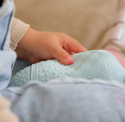 BabySqueezy is a 3-in-1: Newborn Bath Rinser, Teether & Toy