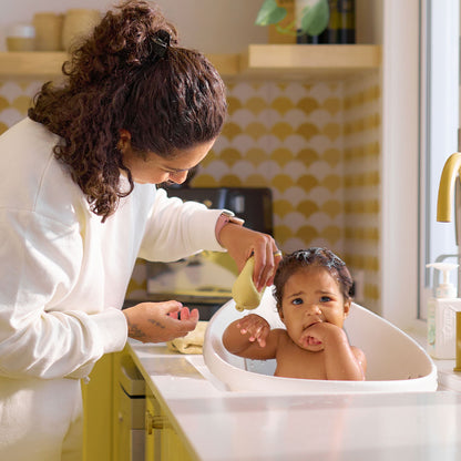 BabySqueezy is a 3-in-1: Newborn Bath Rinser, Teether & Toy