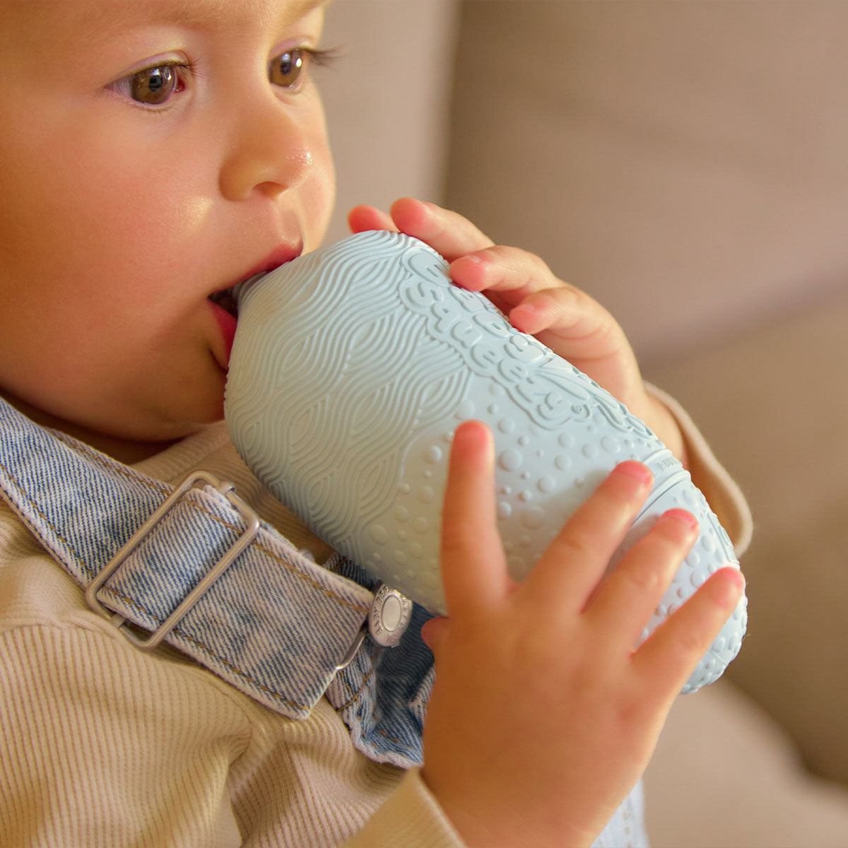 BabySqueezy is a 3-in-1: Newborn Bath Rinser, Teether & Toy