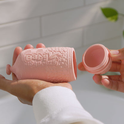 BabySqueezy is a 3-in-1: Newborn Bath Rinser, Teether & Toy