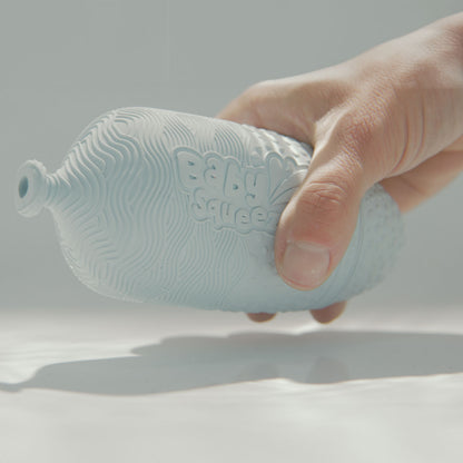 BabySqueezy is a 3-in-1: Newborn Bath Rinser, Teether & Toy