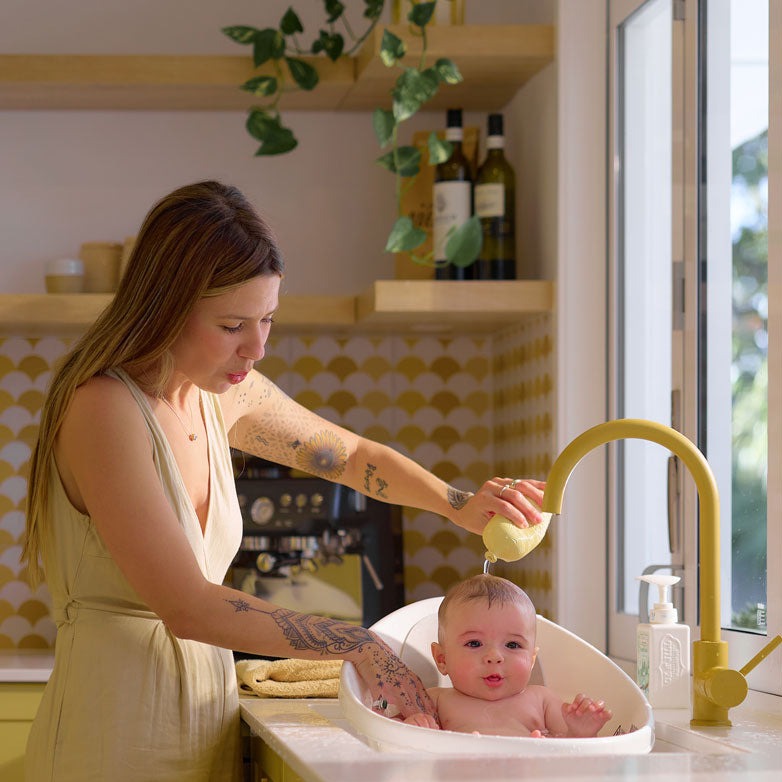 BabySqueezy is a 3-in-1: Newborn Bath Rinser, Teether & Toy