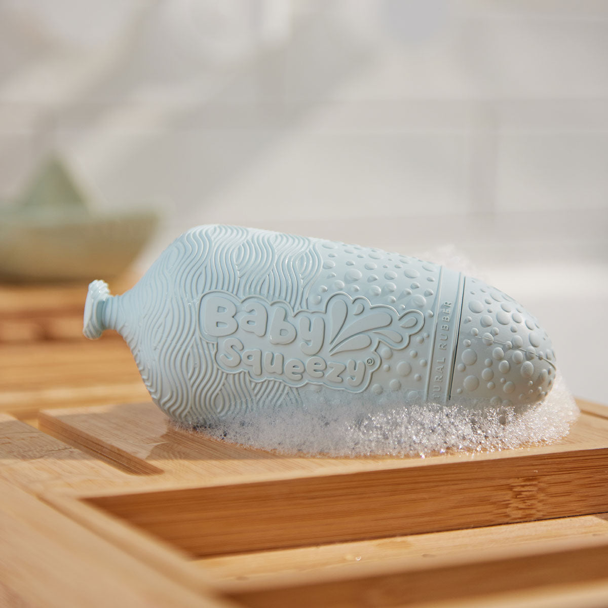 BabySqueezy is a 3-in-1: Newborn Bath Rinser, Teether & Toy