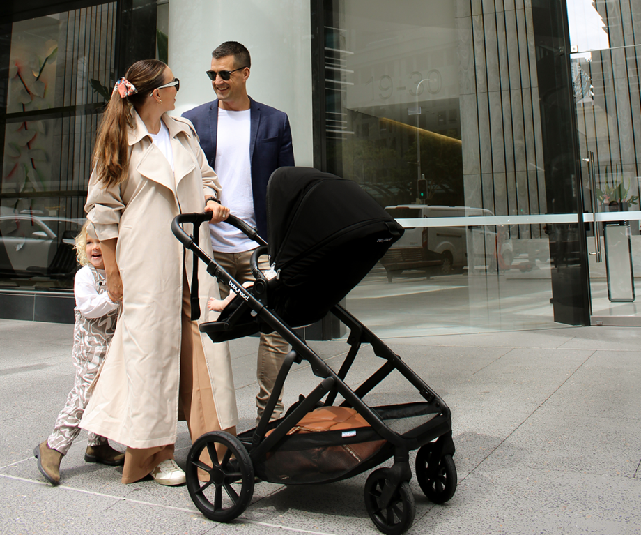 Babyhood Doppio Plus stroller with single seat and ergonomic bassinet, lightweight foldable frame, and sun canopy.