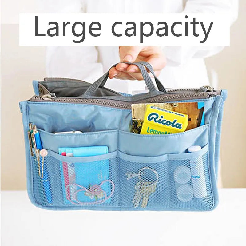 compact bag organiser insert with various compartments, can contain cosmetics, hair items, perfume, creams, keys, electronic devices, all handbag necessities