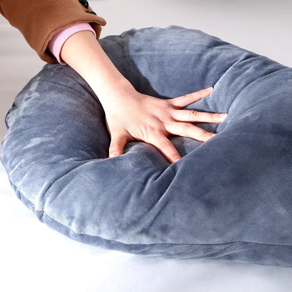 pregnancy bump support pillow with a solid pattern.