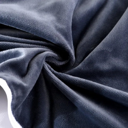 blue pregnancy bump support pillow with a solid pattern.