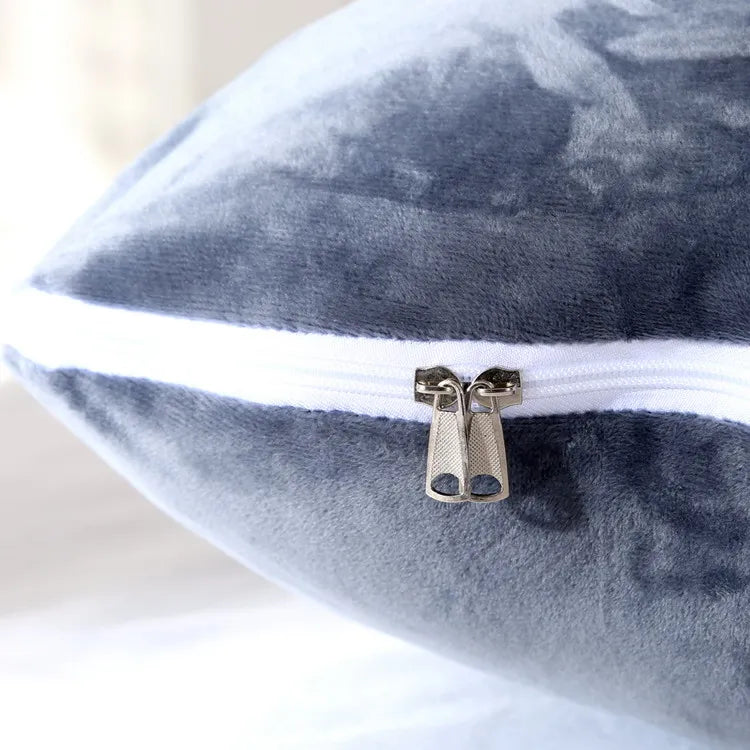 blue pregnancy bump support pillow with a solid pattern.